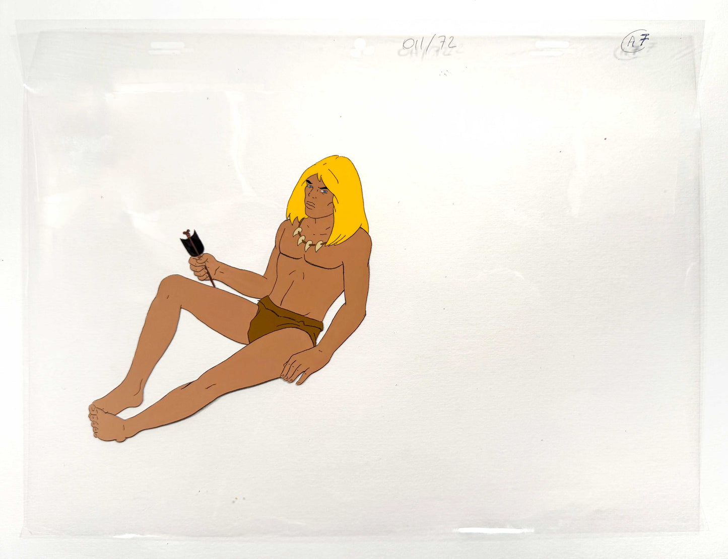 An original hand-painted production cel featuring Rahan, the iconic prehistoric hero from the classic animated series based on the famous French comic created by Roger Lécureux and André Chéret. For sale on FLIP Gallery