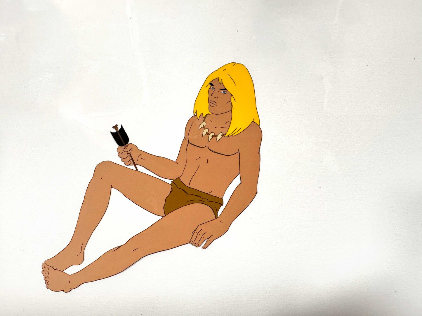 An original hand-painted production cel featuring Rahan, the iconic prehistoric hero from the classic animated series based on the famous French comic created by Roger Lécureux and André Chéret. For sale on FLIP Gallery
