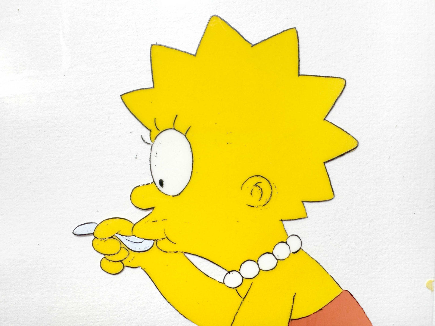 The Simpsons : Original Animation Production Cel of Lisa Simpson (1990’s). For sale on FLIP Gallery